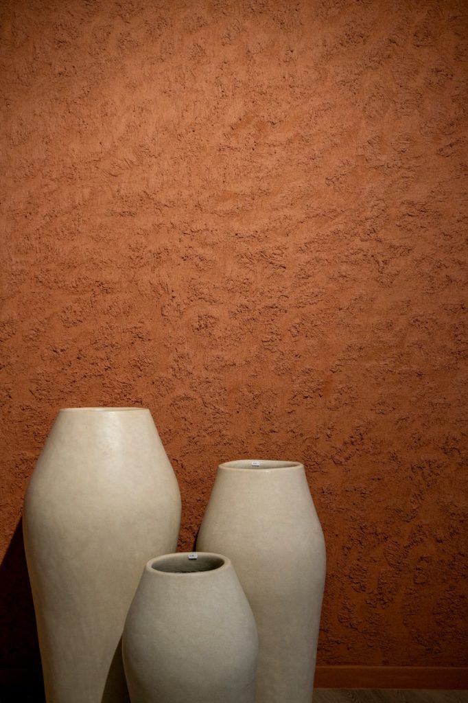 Structuur beton ciré in tint Terracotta