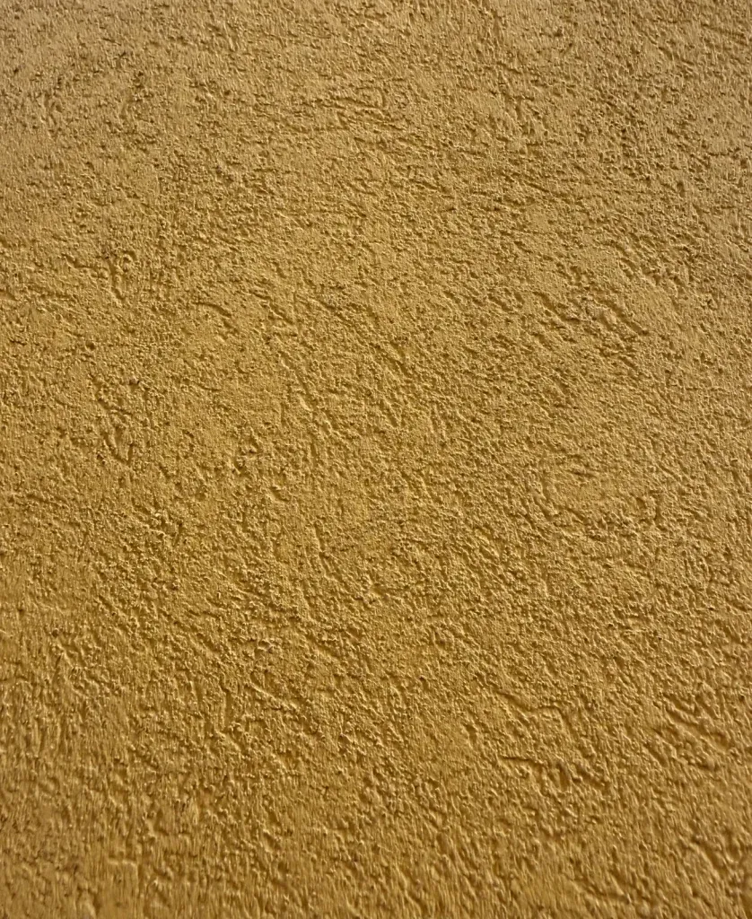 Structuur beton ciré in tint Oker